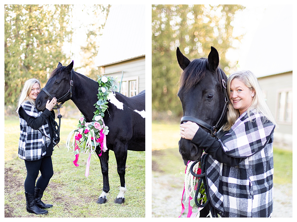 equine maternity photos with black and white paint horse next to a green barn