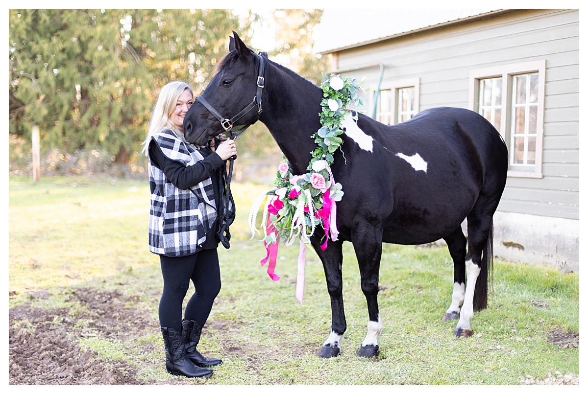 horse maternity photos with floral arrangement