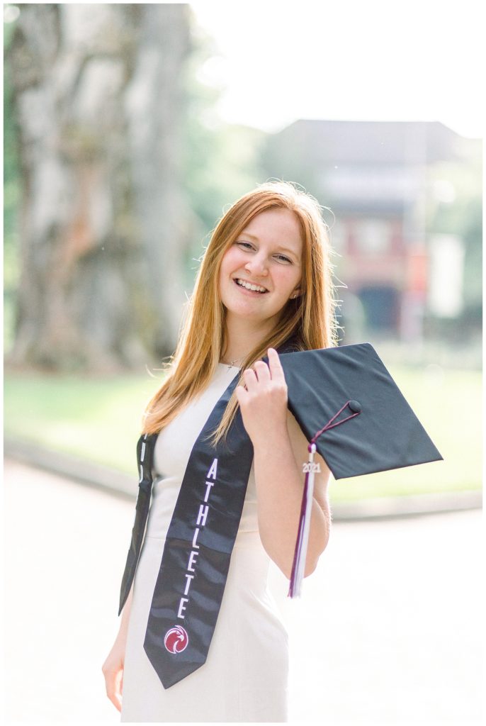 photo of girl wearing graduation cap & stole to celebrate upcoming graduation from university