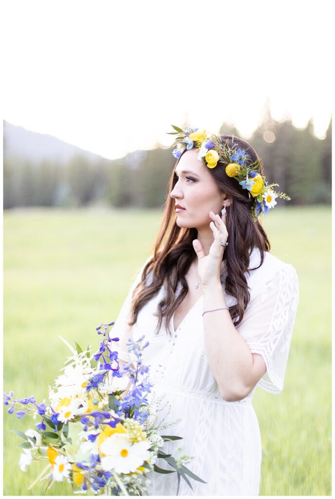 Montana luxury ranch elopement with blue, yellow, and white fresh florals by Bleeding Heart Flower Farm at Triple Creek Ranch in Darby, Montana